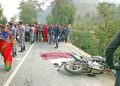 Relatives of two motorcycle riders obstract the road along the Prithvi Highway demanding compensation after the riders died after being hit by a tipper in Ghansikuwa of Tanahun district on Thursday, December 31, 2015. Photo: Madan Wagle